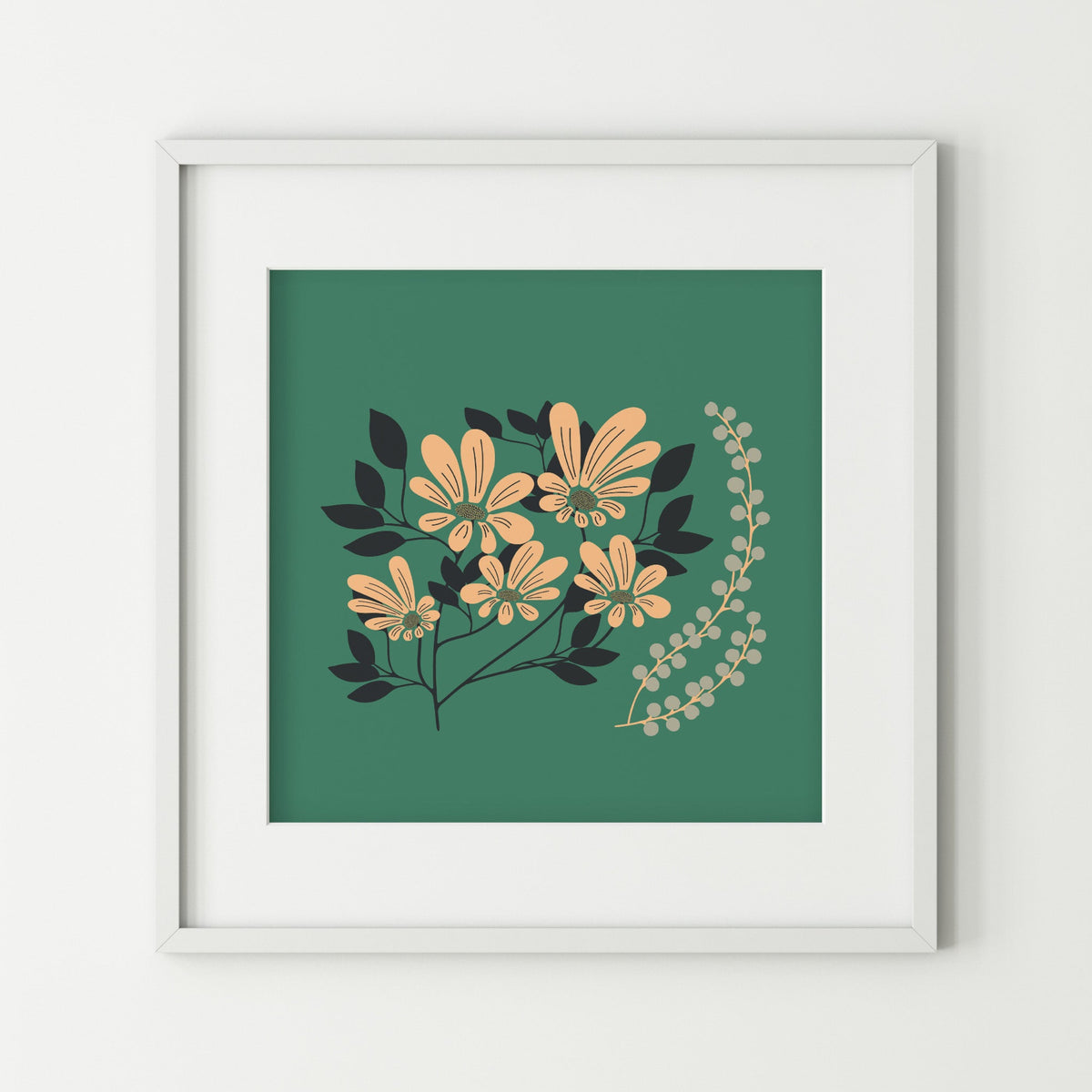 Framed artwork with floral design on a green background