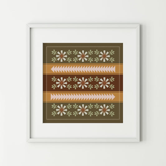 Framed artwork with a geometric pattern on a white wall