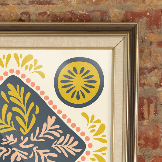 Decorative framed artwork with geometric pattern on a textured wall.