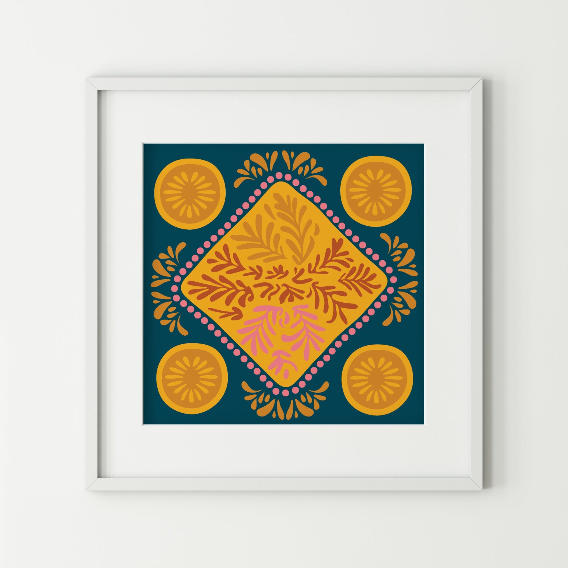 Framed artwork with a geometric pattern on a white wall