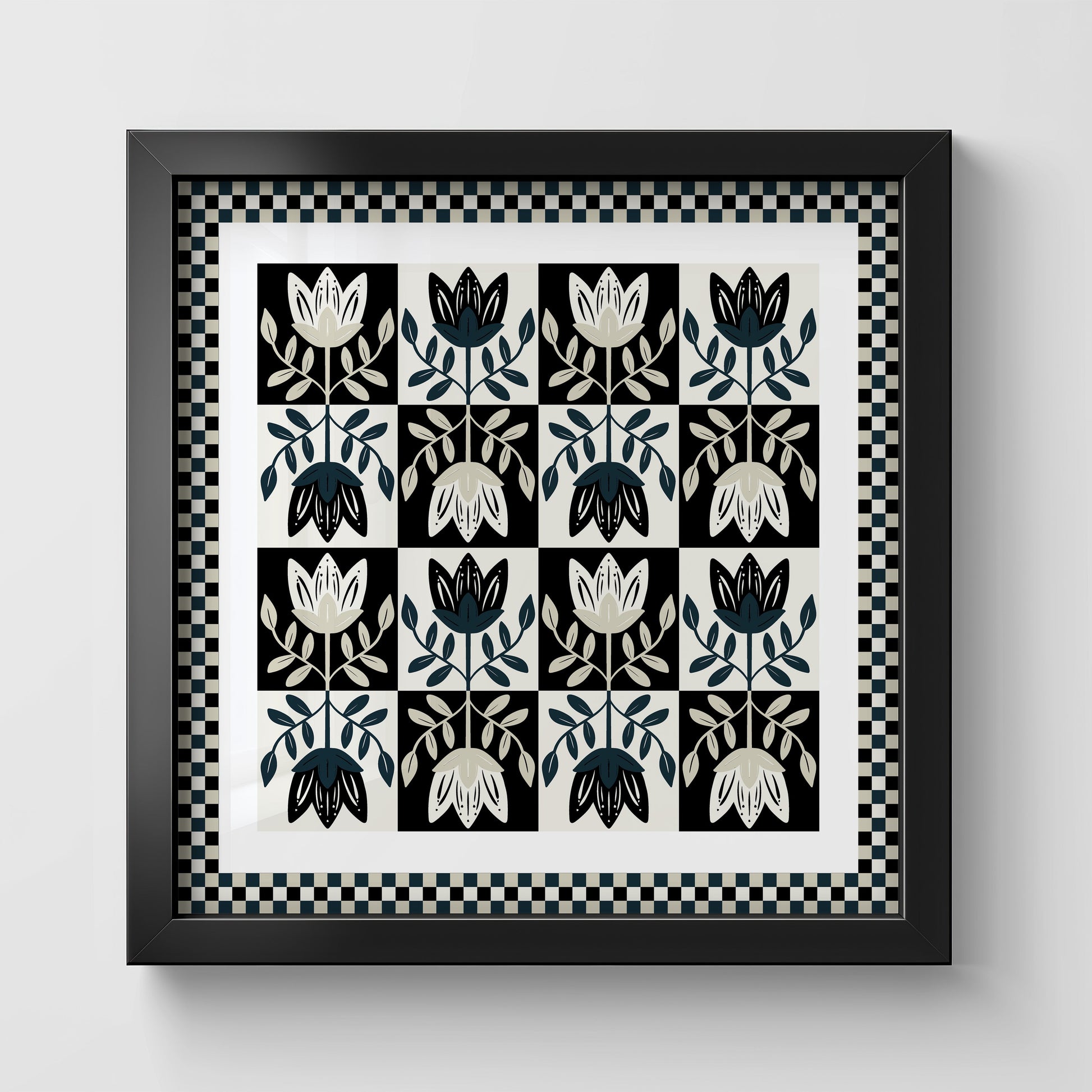 Framed artwork with black and white floral pattern on a light gray background